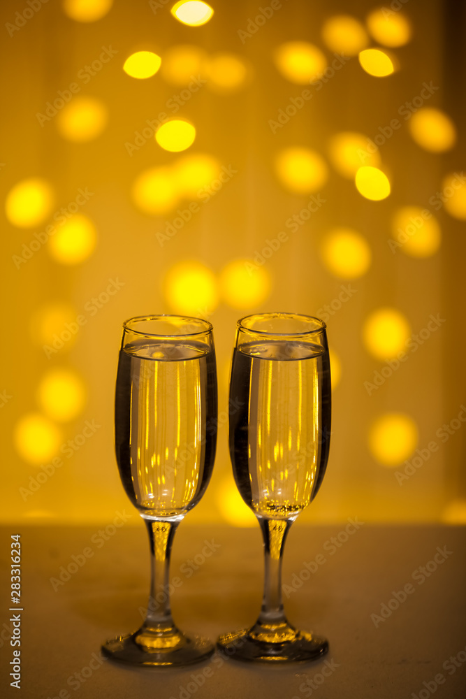 Glasses on a background of illumination Glasses on a background of illumination