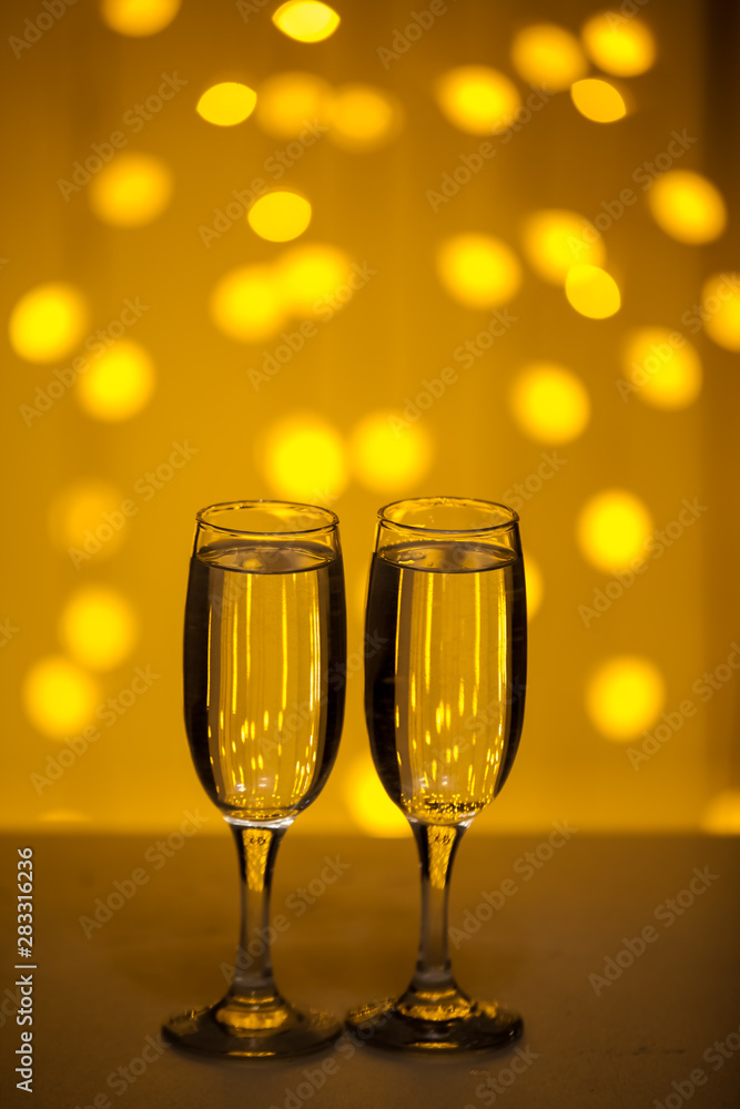 Glasses on a background of illumination