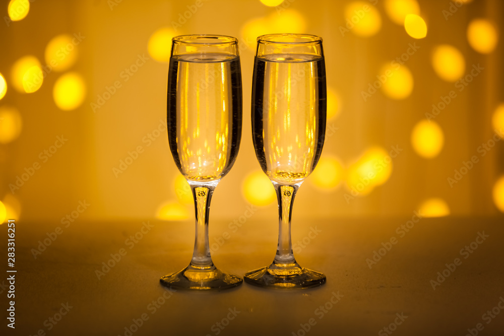 Glasses on a background of illumination Glasses on a background of illumination