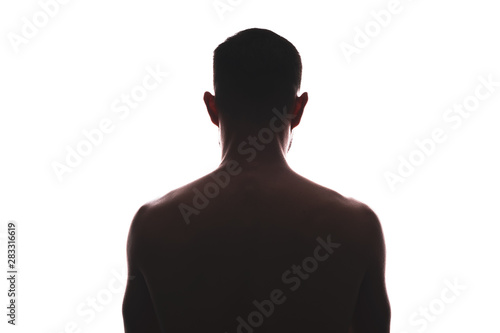 Male silhouette from the back, muscular look isolated on white