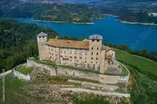Aerial view Lake Santa Giustina, Castel Cles, bridge over the lake. North of Italy.