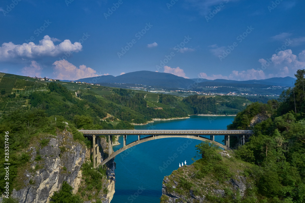 Aerial view Lake Santa Giustina, Castel Cles, bridge over the lake. North of Italy. Aerial view Lake Santa Giustina, Castel Cles, bridge over the lake. North of Italy.