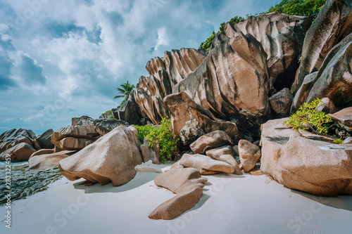 Stunning tropical island at Seychelles, giant granite rocks on the beach.