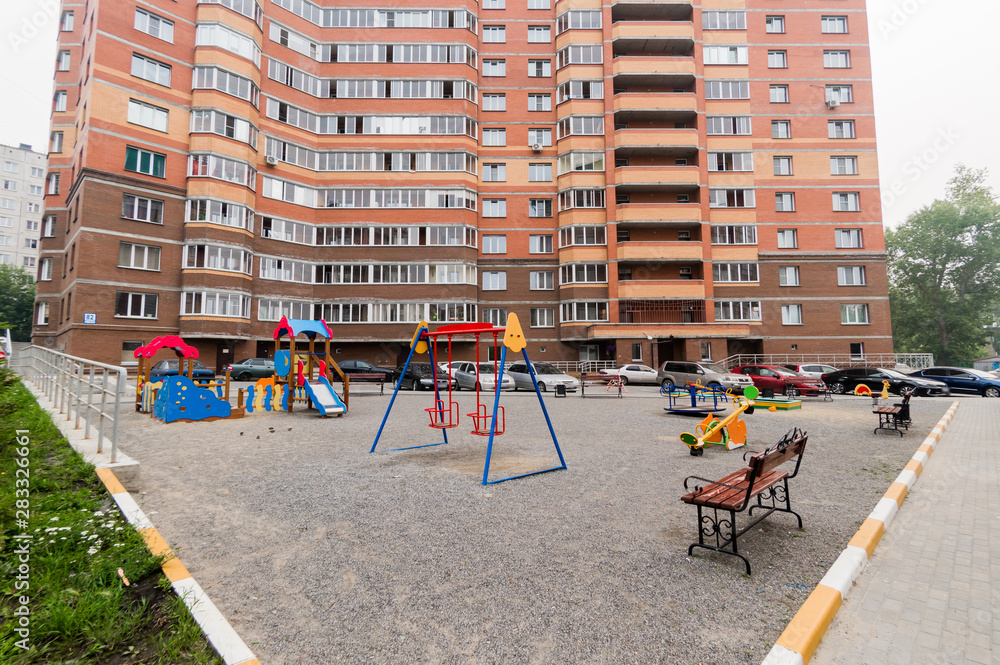 Russia, Novosibirsk - June 15, 2019: Russian courtyards. buildings, house architecture, exterior. city views Russia, Novosibirsk - June 15, 2019: Russian courtyards. buildings, house architecture, exterior. city views
