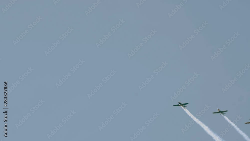 Aircrafts in formation during air show Aircrafts in formation during air show