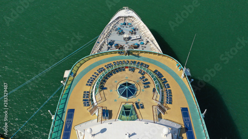 Aerial top view photo of huge open deck cruise liner ship docked in marina © aerial-drone