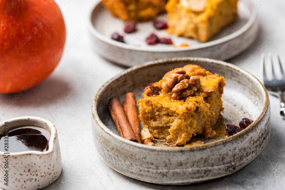 Autumn Pumpkin Pie Cake With Walnuts, Cinnamon, Maple Syrup. Closeup view. Comfort food