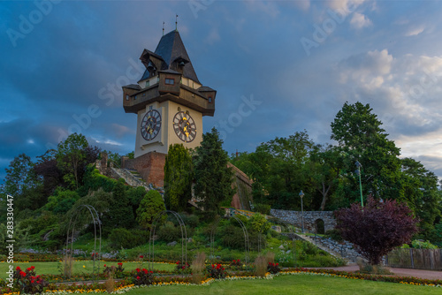 The famous clock tower (Grazer Uhrturm) and gardens on Shlossberg hill, Graz, Styria region, Austria