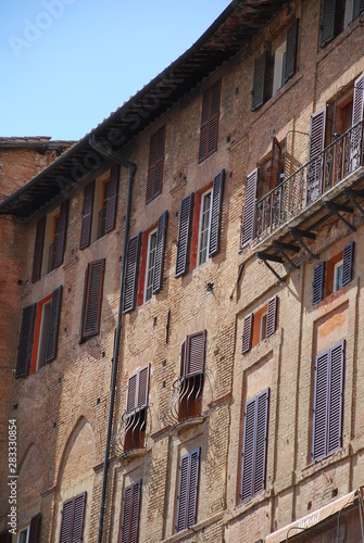 Buildings in the Il Campo square in central Siena  Tuscany  Italy