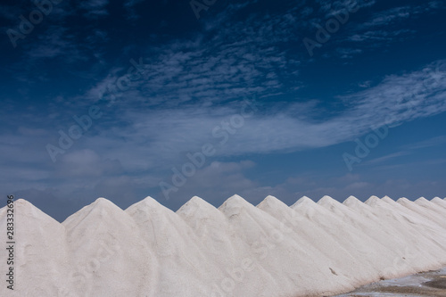 hills of produced salt in a seawater saline