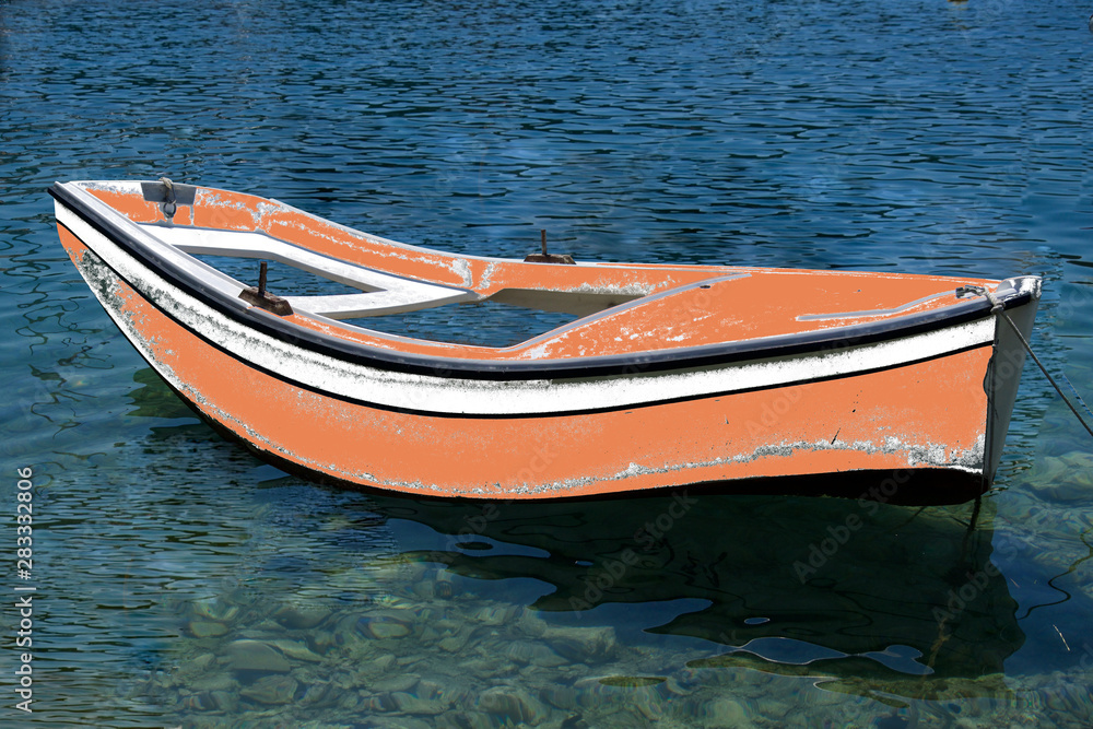 Ailling rowing boat on the blue sea Ailling rowing boat on the blue sea
