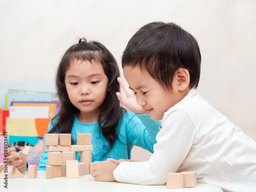 The conflict between two sisters. The kids are fighting over for toys at home. The conflict between two sisters. The kids are fighting over for toys at home.