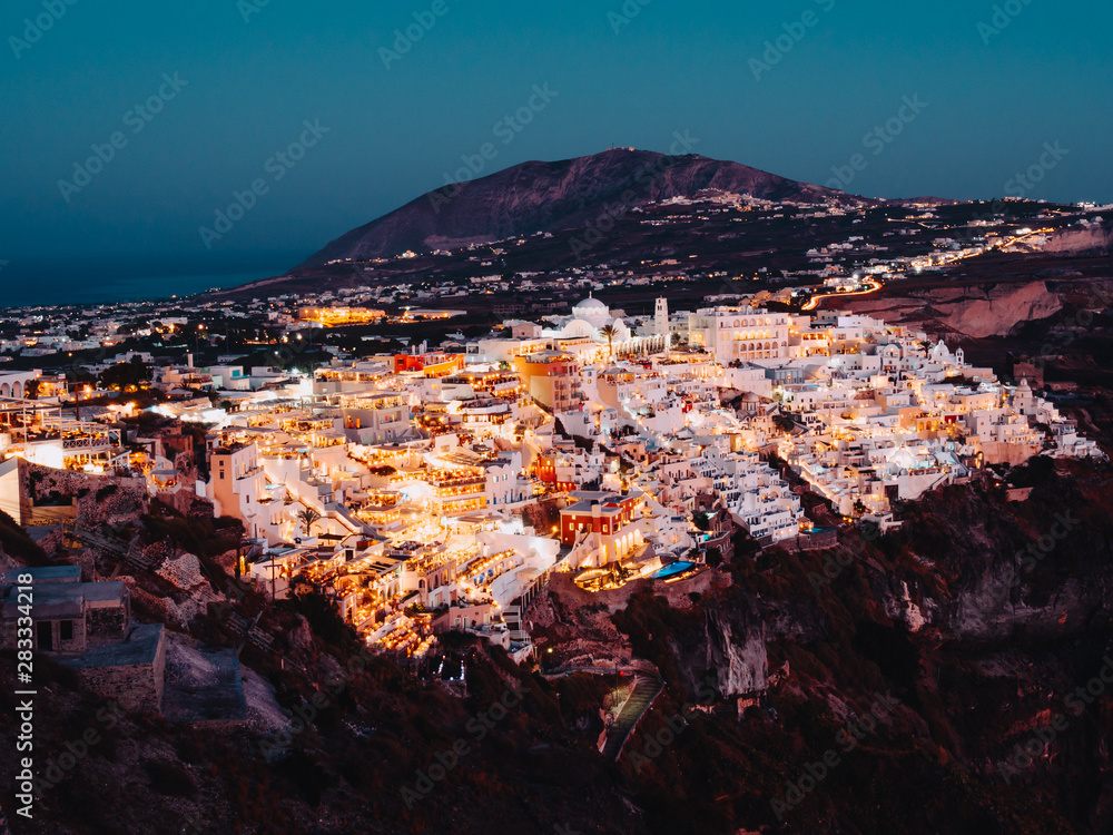 Night view of Fira, the capital of Santorini, Greece