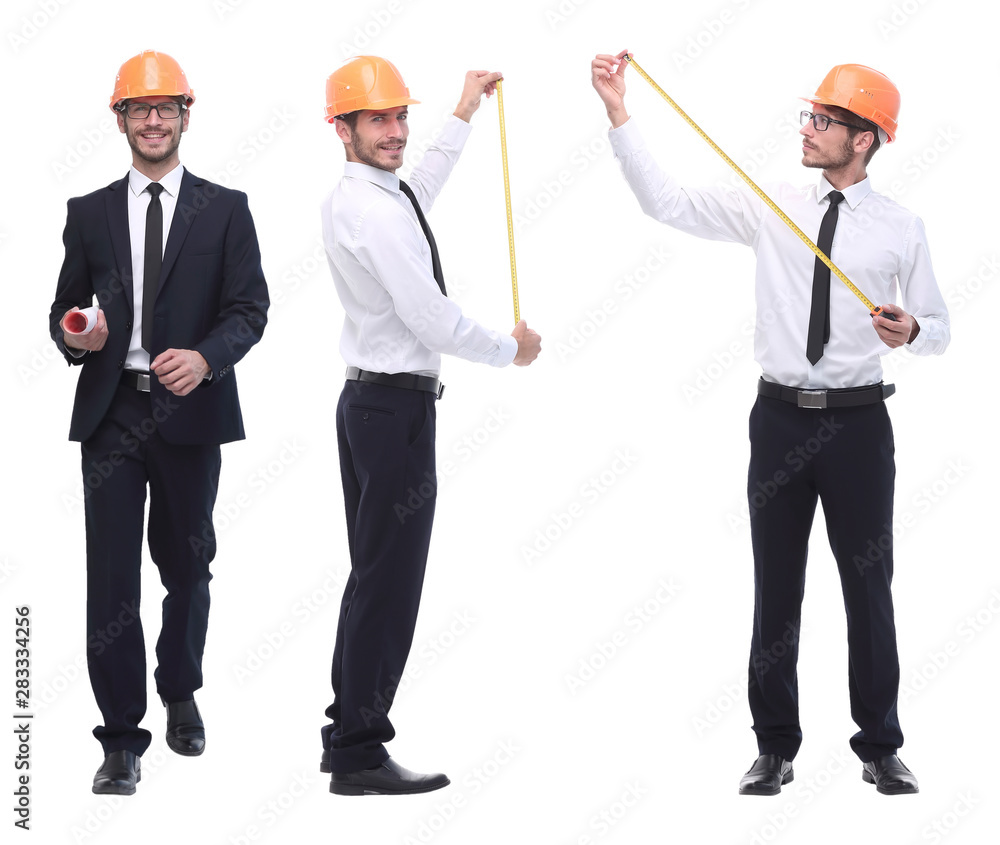 in full growth .successful architect engineer in orange helmet. in full growth .successful architect engineer in orange helmet.