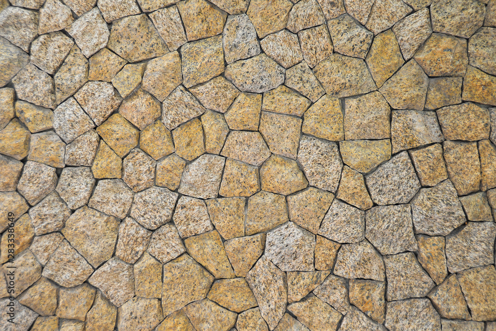 Stone wall of fortress close up as background. Stone wall of fortress close up as background.
