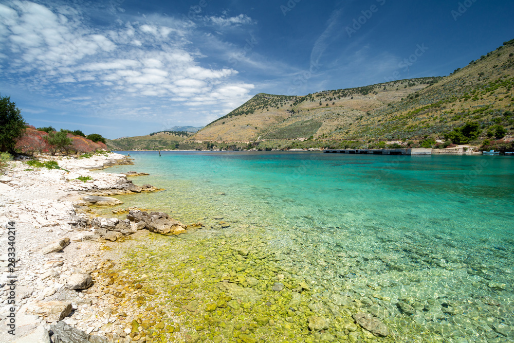 crystal clear water of ionian sea in Porto Palermo in Albania