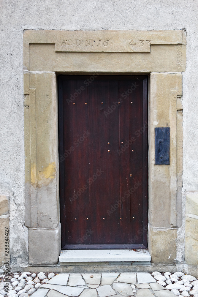 Wooden Door in Medieval Church. 15th Century. Church St. Rocha in the Stary Sacz, Poland. Wooden Door in Medieval Church. 15th Century. Church St. Rocha in the Stary Sacz, Poland.