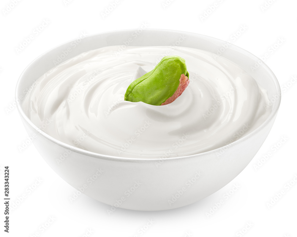 pistachio nut with sour cream, yogurt, isolated on white background, clipping path, full depth of field pistachio nut with sour cream, yogurt, isolated on white background, clipping path, full depth of field