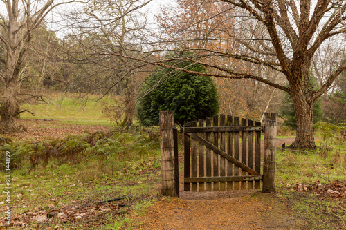 Closed gate on pathway in winter Golden Valley Tree Park