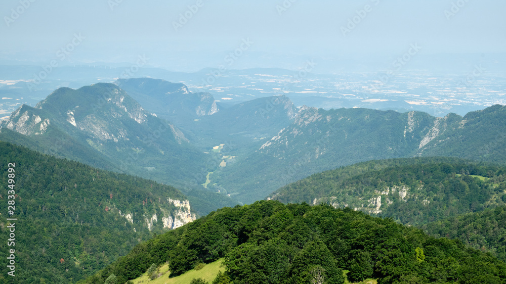 Naklejka premium The bowl-shaped forest of Saou viewed from Les Trois Becs is one of Europe's best examples of a perched syncline formation