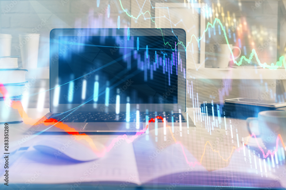 Stock market graph on background with desk and personal computer. Double exposure. Concept of financial analysis. Stock market graph on background with desk and personal computer. Double exposure. Concept of financial analysis.
