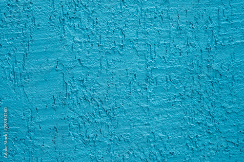 Blue cement wall,Rough surface look like blue sand.Background texture design. Old light blue cement texture and background