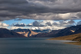 Stormy sky over Tso Moriri lake in Ladakh region, India. The lake is at an altitude of 4,522 mt. and accessibility is largely limited to summer season. The area are a protected reserve