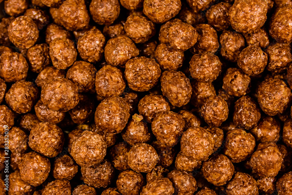 Texture of chocolate cereal balls for the background Texture of chocolate cereal balls for the background