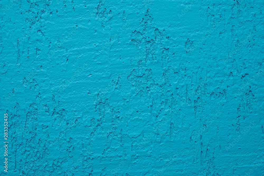 Blue cement wall,Rough surface look like blue sand.Background texture design. Old light blue cement texture and background Blue cement wall,Rough surface look like blue sand.Background texture design. Old light blue cement texture and background
