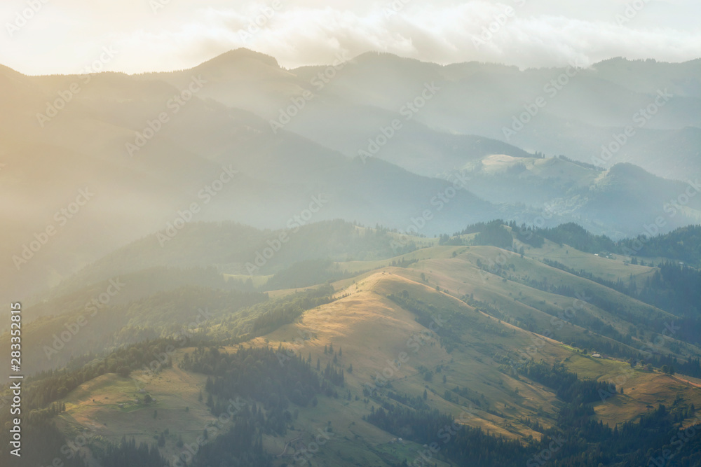 Morning landscape on the mountains with soft light in the air. Morning landscape on the mountains with soft light in the air.