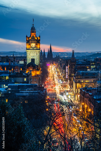 View of Princes Street with light trails in Edinburgh, Scotland, at dusk © alpegor