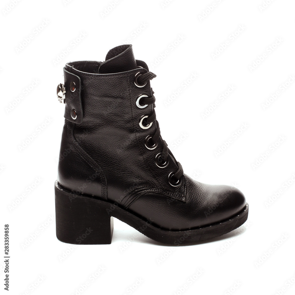 Black women's boot isolated on white.