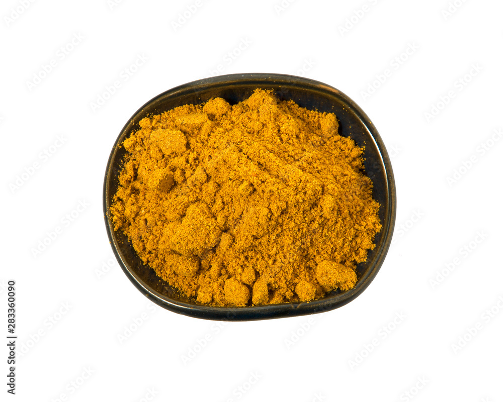 Turmeric Powder on Isolated White Background. View from above. Flat lay. Turmeric Powder on Isolated White Background. View from above. Flat lay.
