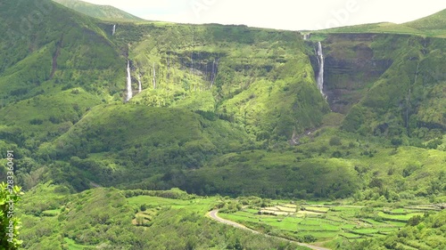Waterfalls Poco Ribeira do Ferreiro / Alagoinha in the mountains flowing into a lake, Poco das Patas, between Faja Grande and Fajazinha, Island of Flores, Azores, Portugal, Europe, Atlantic Ocean