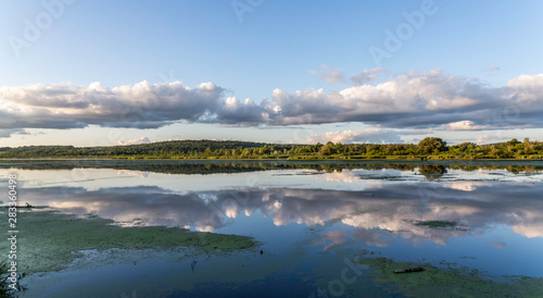 waterscape of a beautiful lake in Pennsylvania with cloud cover 