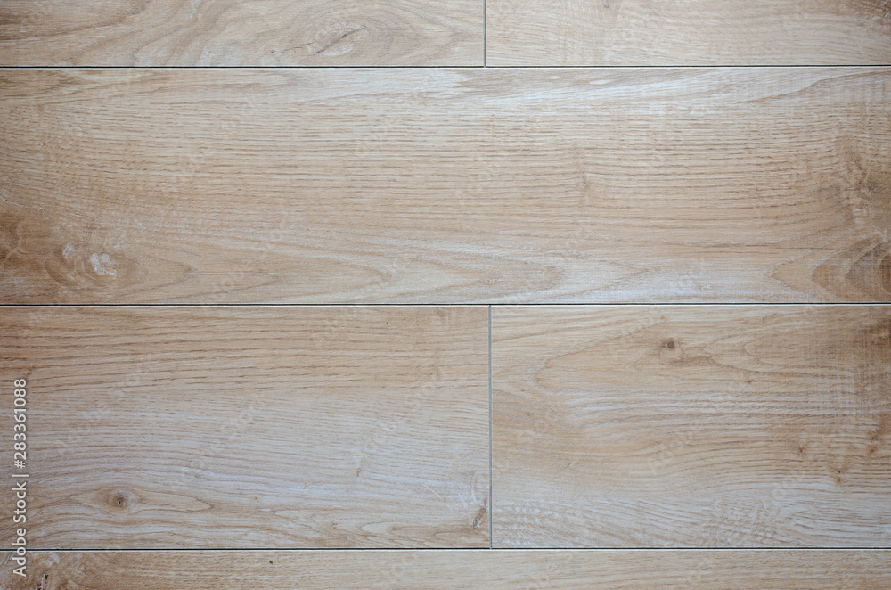 Fototapeta premium Beige and brown floor tiles with wooden look – suitable as a background