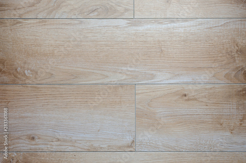 Beige and brown floor tiles with wooden look – suitable as a background