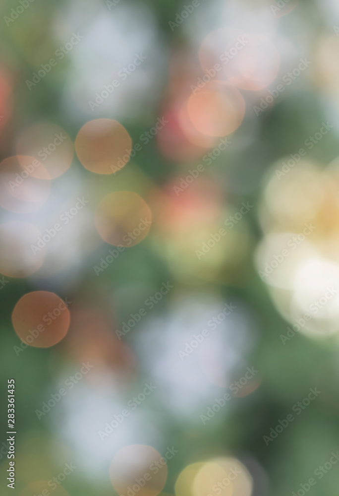 Obraz premium Blurred Bokeh abstract texture. Colorful circles shine bright light, Christmas night and background.
