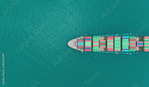 Aerial top view container ship on the sea carrier container for logistics, import export, shipping or transportation.