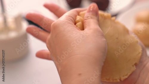 Wallpaper Mural Process of making moon cake for Mid-Autumn Festival - Wrapping red bean paste filling with pastry dough. Woman festive homemade concept, close up. Torontodigital.ca