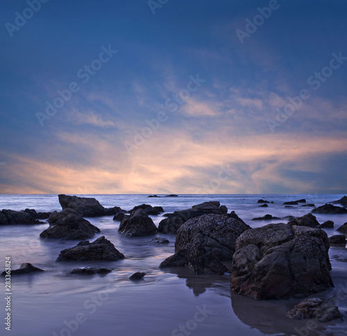 Ngapali beach at sunset in Myanmar. Beautiful sunset over the sea abstract background