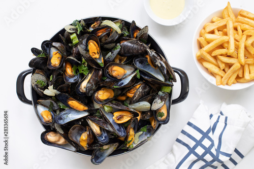 Belgian mussels with potato fries photo