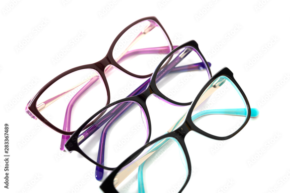 Three pairs of plastic fashionable eyeglass frames. Isolated