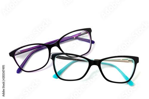 Two pairs of plastic fashionable eyeglass frames. Isolated