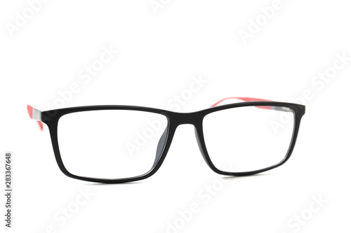 Plastic eyeglass frame with red inserts. Isolated
