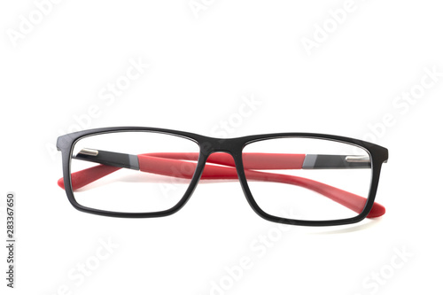 Plastic eyeglass frame with red inserts. Isolated