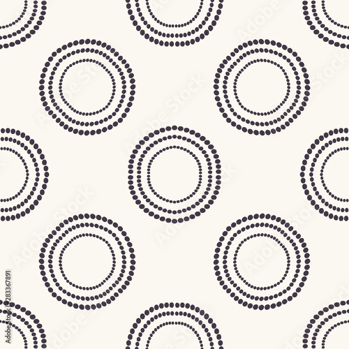 Seamless pattern. Hand drawn polka dot background. Monochrome dotty black and white concentric circle. All over print vector swatch