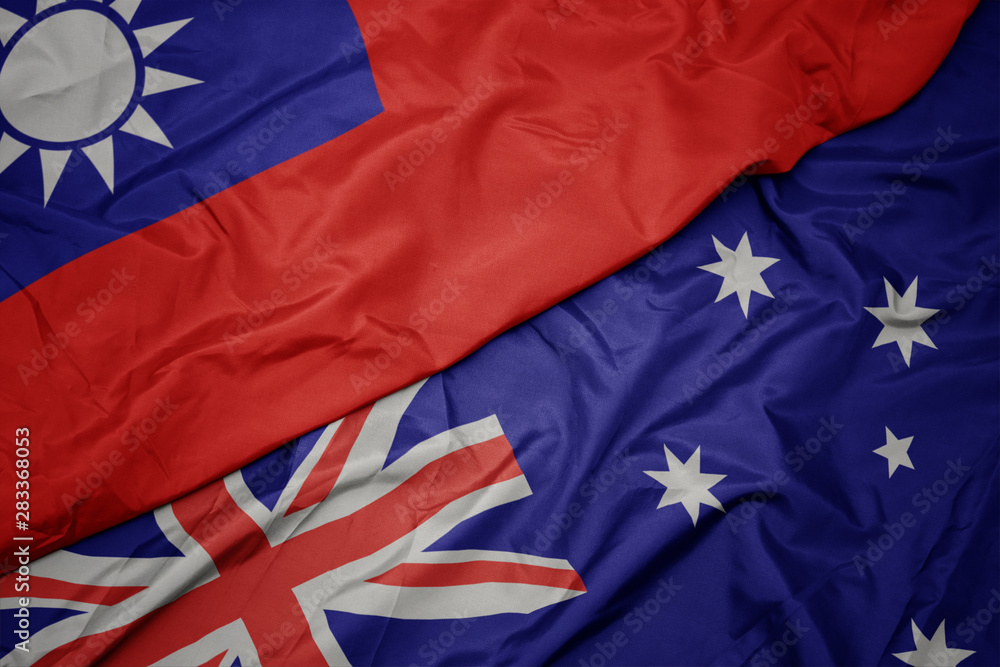 waving colorful flag of australia and national flag of taiwan. waving colorful flag of australia and national flag of taiwan.