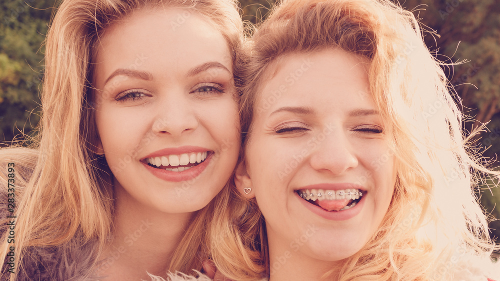 Fototapeta premium Two crazy women having fun outdoor