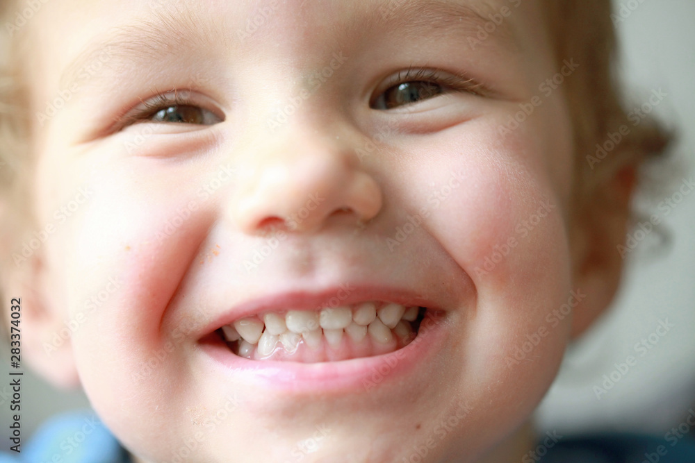 Happy cheerful child portrait close up Happy cheerful child portrait close up